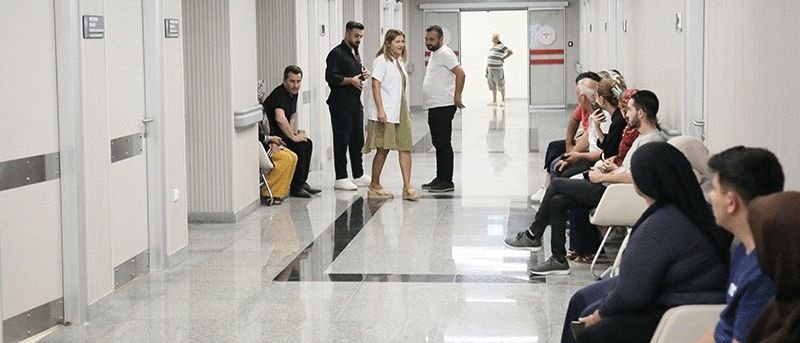 Patients waiting in a hospital outpatient corridor